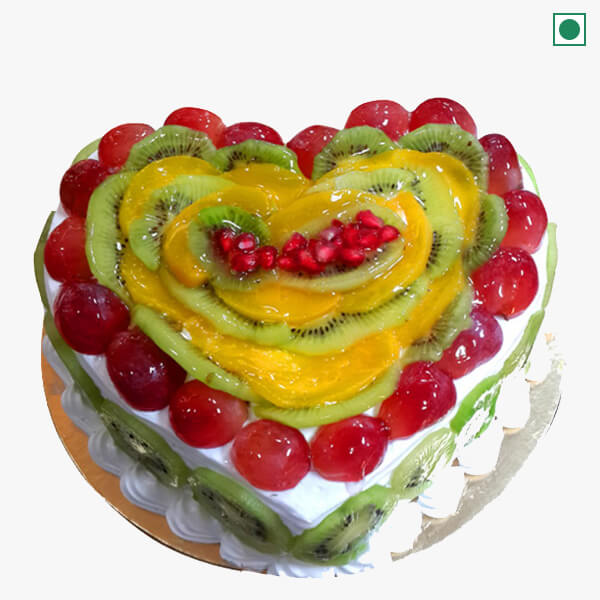 heart shape cake decoration with fruits